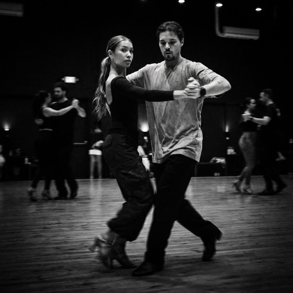 Couple practicing dance steps together on the dance floor